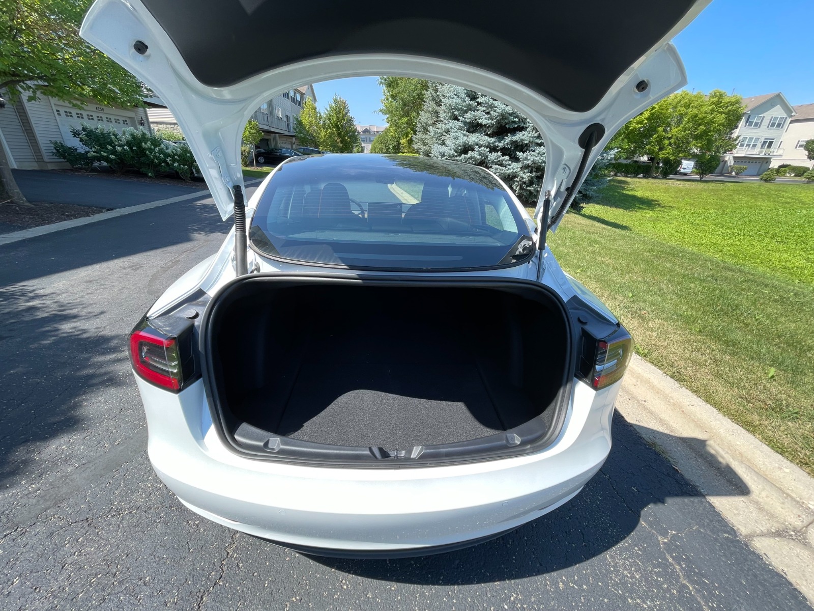 2022 tesla model 3 standard range plus curb weight
